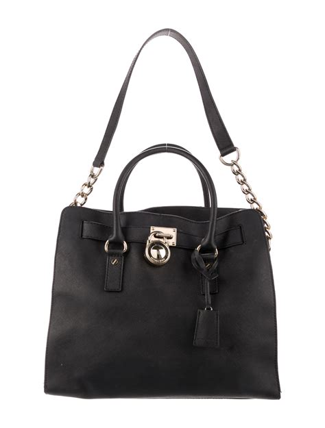 atasun michael kors|Michael Kors leather tote.